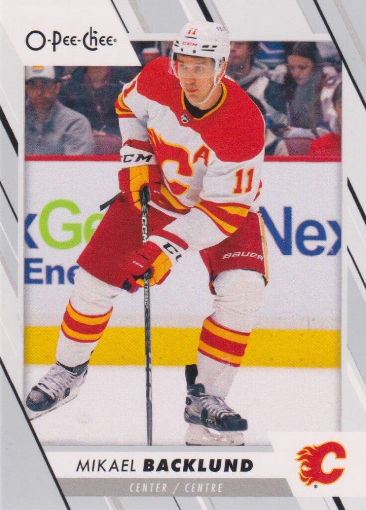 2023/24 O-Pee-Chee – M. Backlund Cal 64